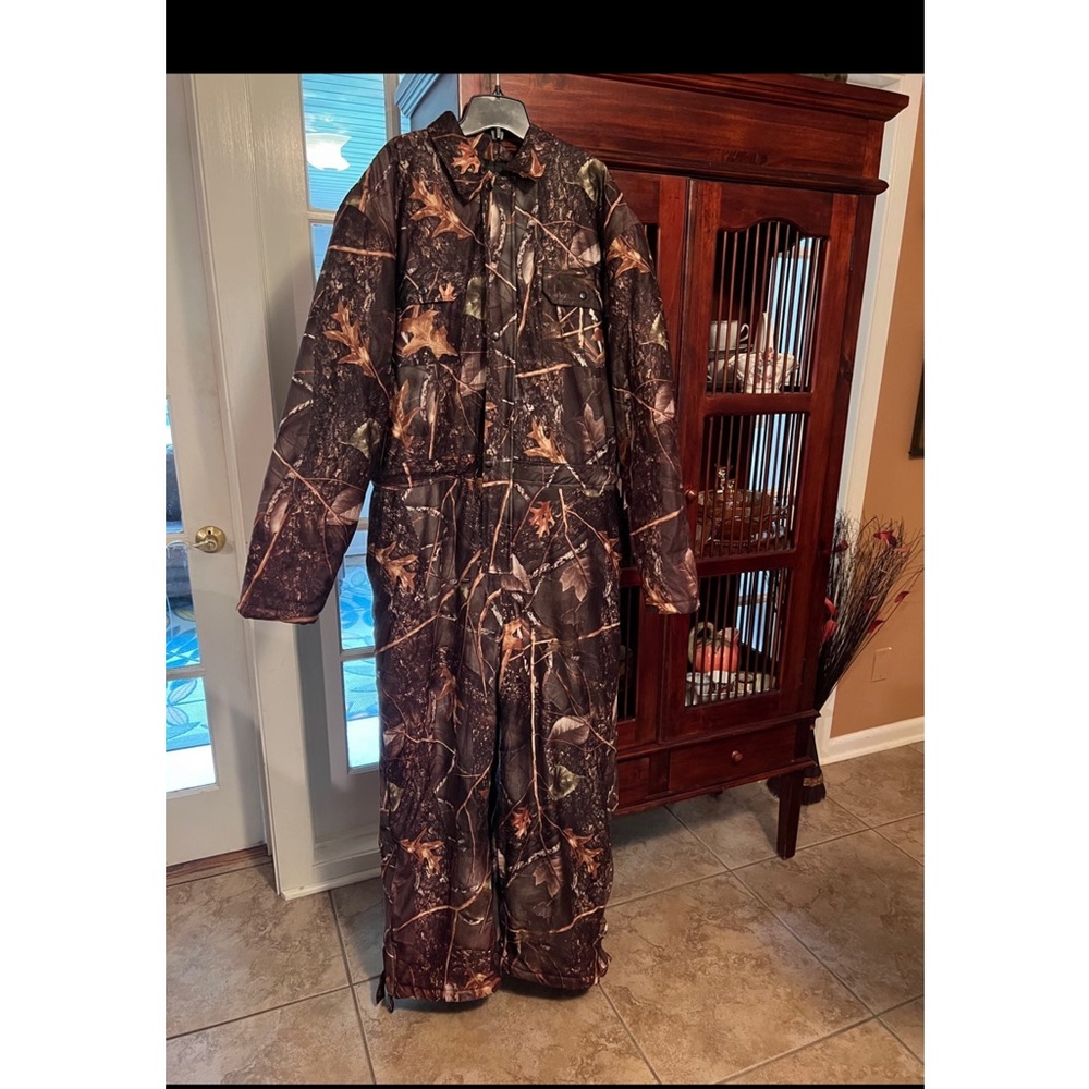 Camouflaged coveralls.